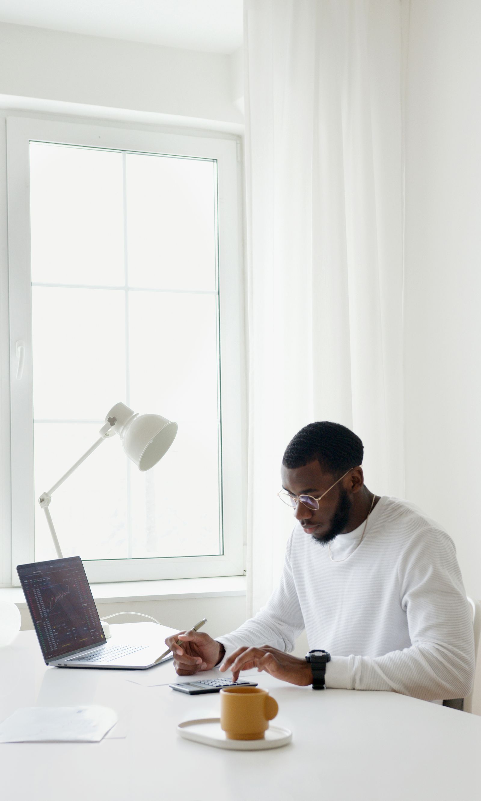 A professional working comfortably from a furnished home